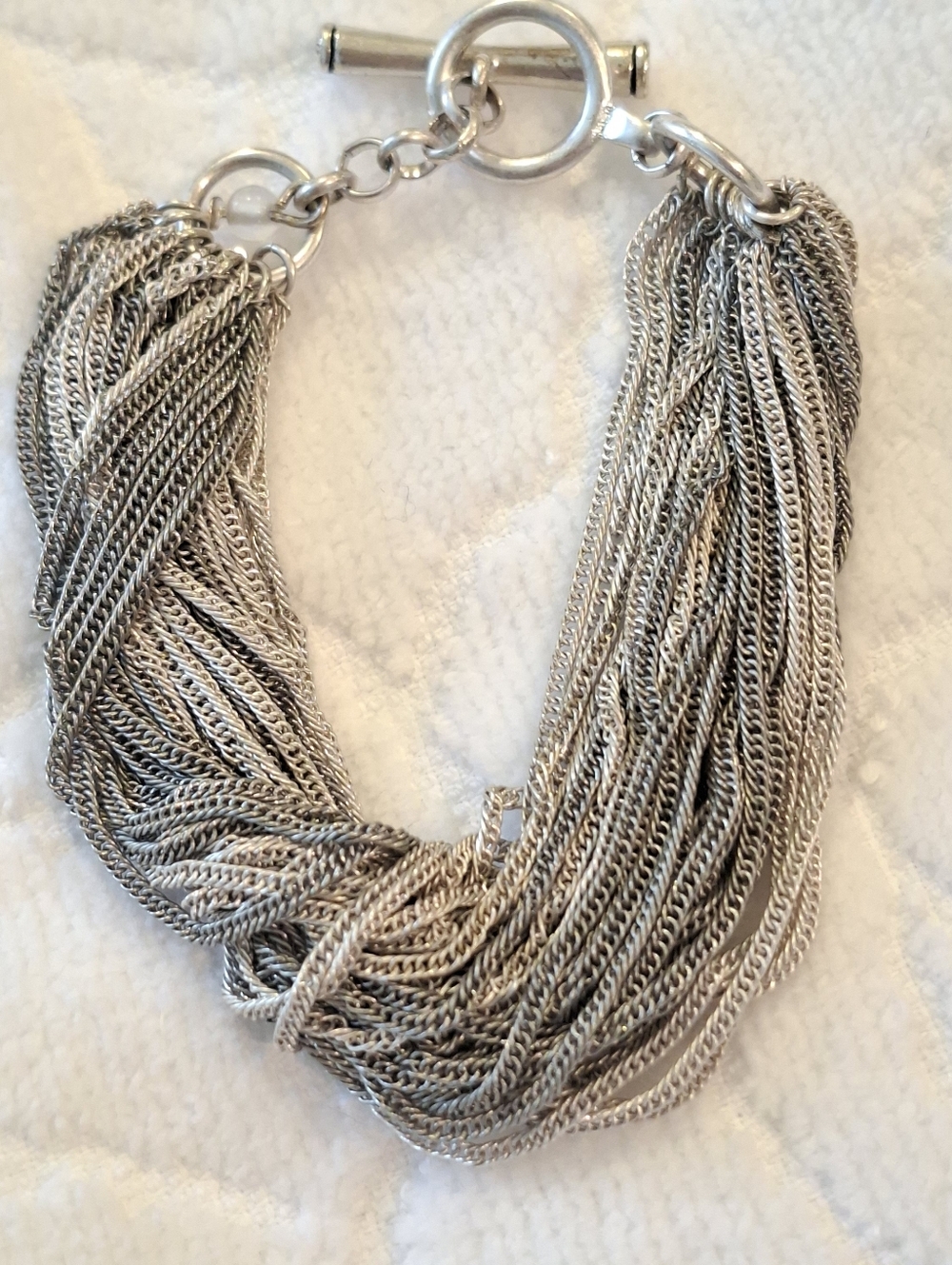 KENNETH COLE TWO TONE MULTI CHAIN TOGGLE BRACELET